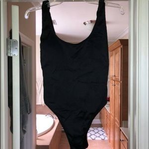 High bikini line swimsuit, low back. Brand new!